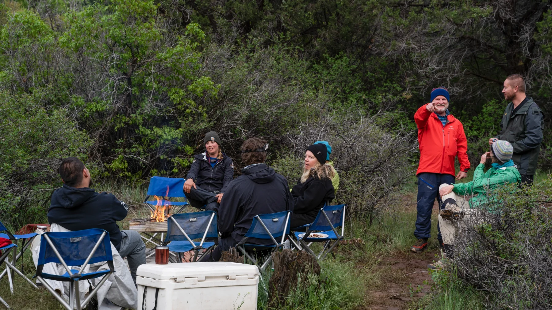 Arkansas River Rafting at camp - guides and guests around fire