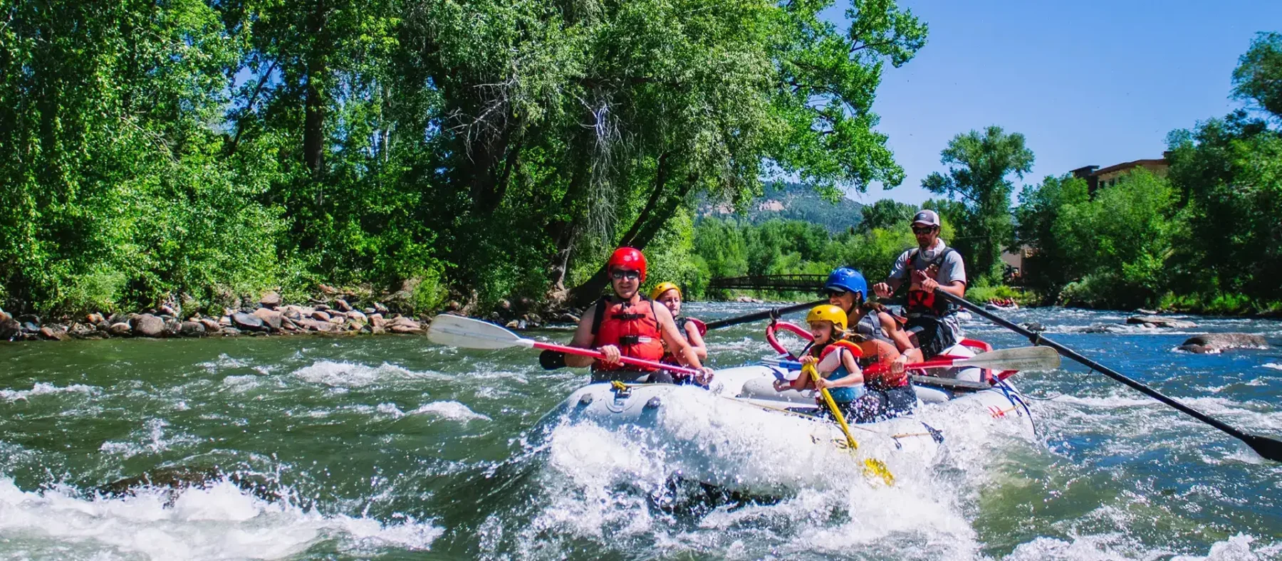 Lower Animas river rafting in durango colorado - scenic view with family on boat
