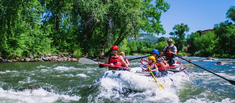 Lower Animas river rafting in durango colorado - scenic view with family on boat