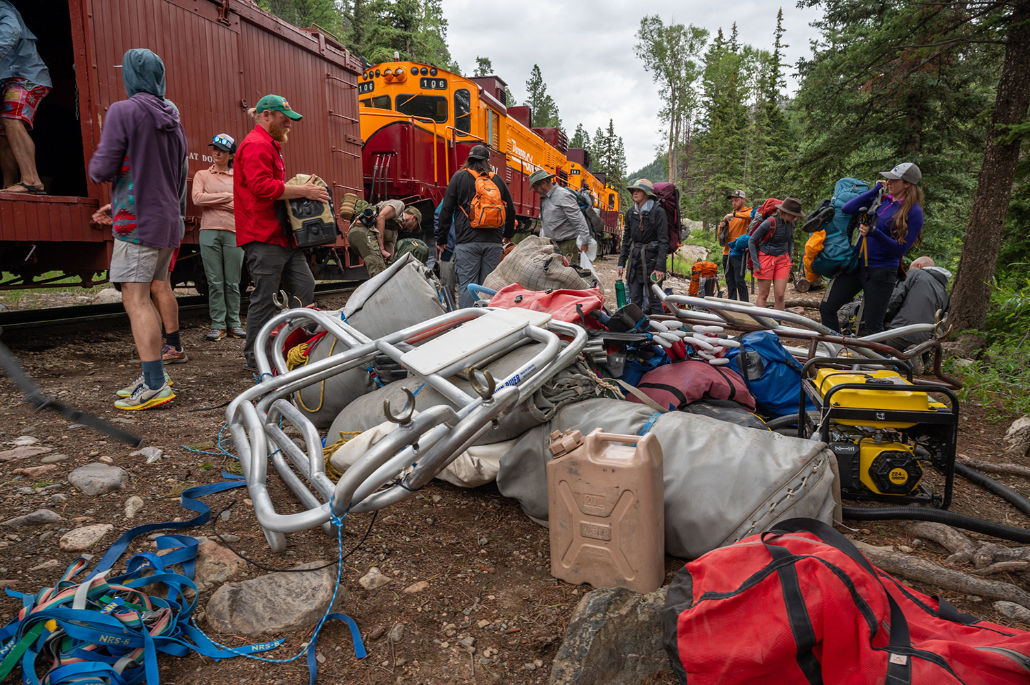 Close up shot of people unloading gear off the Durango & Silverton Narrow Guage Railroad - Needleton, Colorado