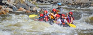 Whitewater rafting through rapids in Clear Creek - Idaho Springs, Colorado