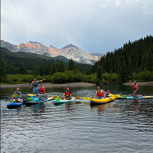 Stand up paddle boarding on Trout lake near Telluride CO - Mountain backdrop