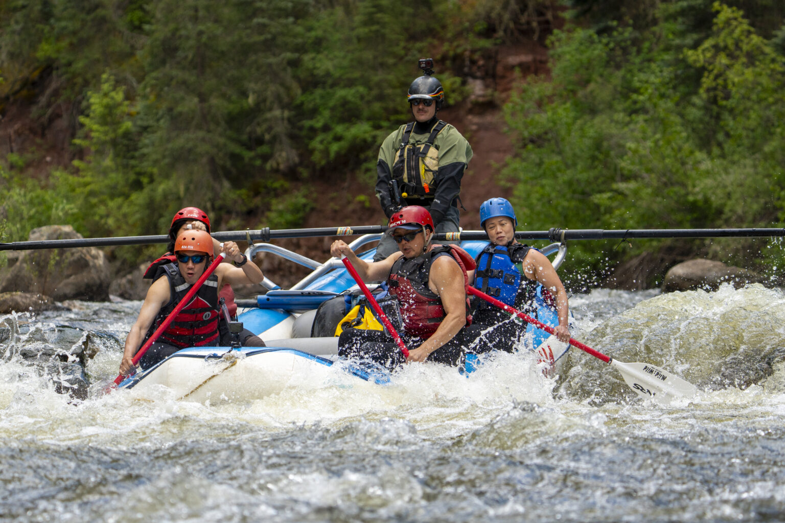 Raft dropping into a rapid on the Upper Piedra River