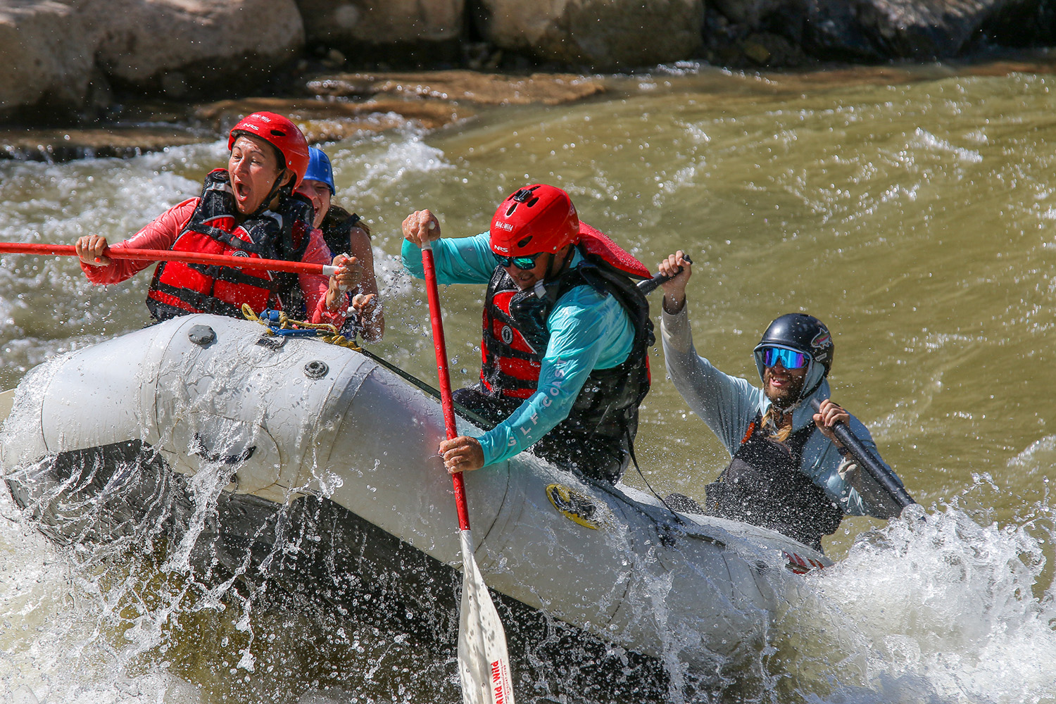 Close up of raft going through Smelter whitewater park - Paddling through splashes - Durango CO - Mild to WIld