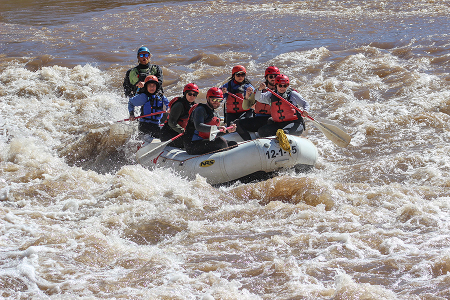 Raft going through rapids on the Salt River - Arizona