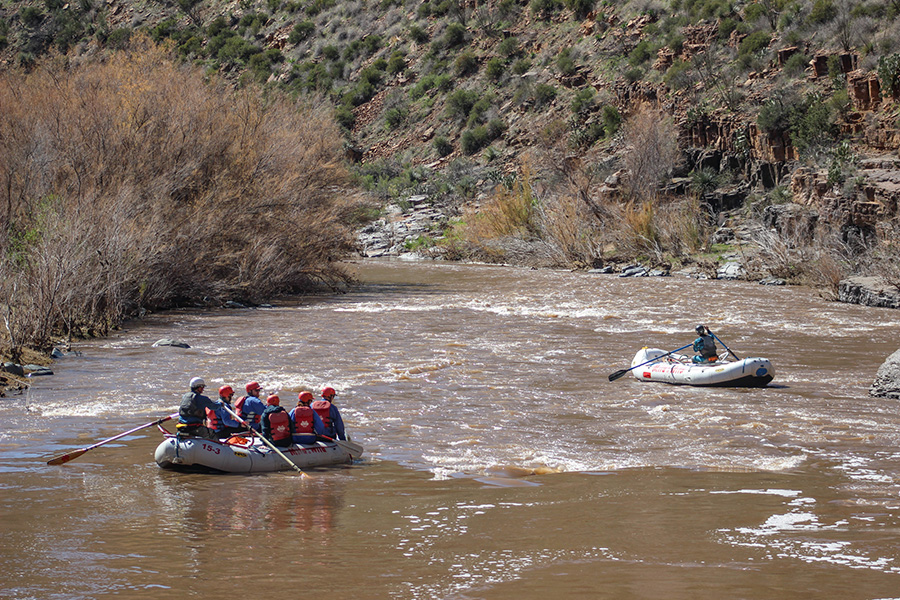 wide view of rafts going down the Salt River - desert scenery