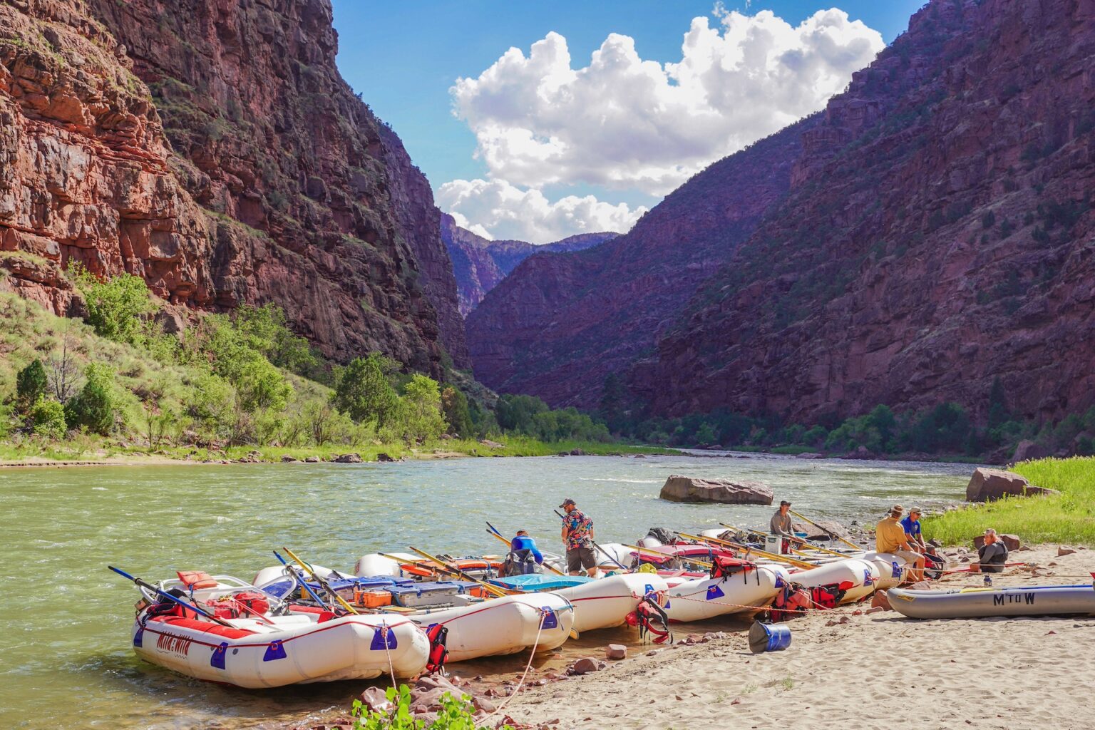 Five boats beached at a camp in Gates of Lodore - Mild to Wild