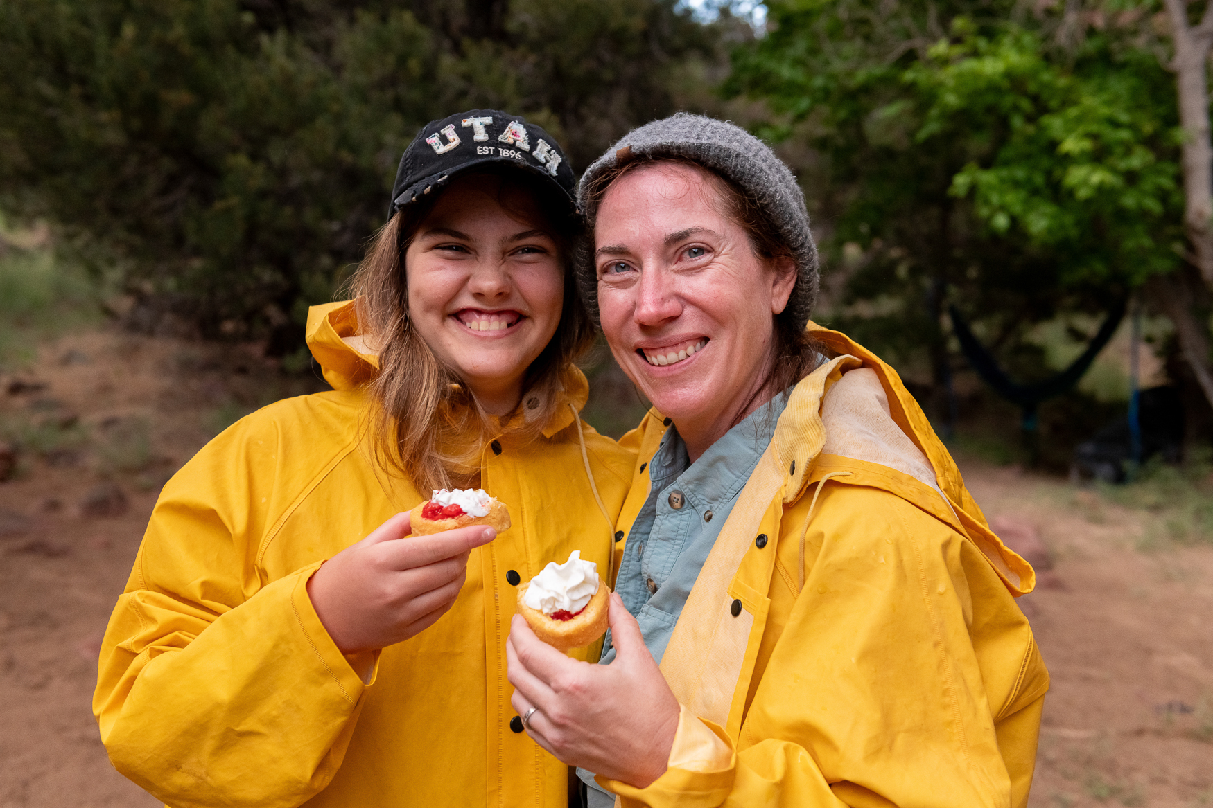 Mother and daughter smile for the camera holding strawberry shortcakes - Mild to Wild