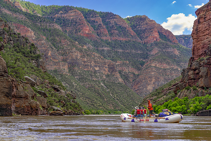 A wide canyon view of rafting on the Yampa River