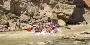 Rafting through rapids in Desolation Canyon - Mild to Wild