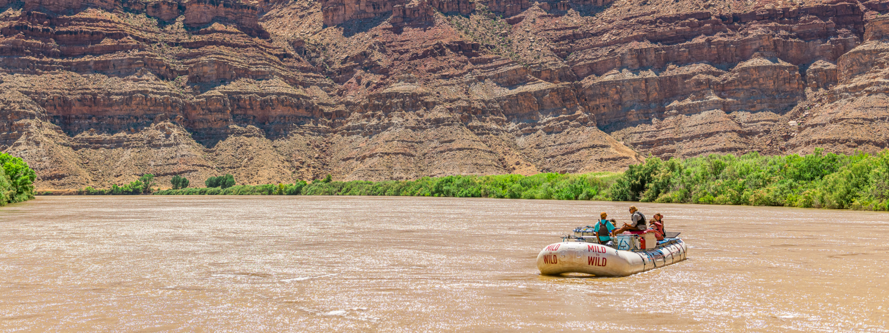 Wide shot of Cataract Canyon with Motor rig boat in middle - Mild to Wild