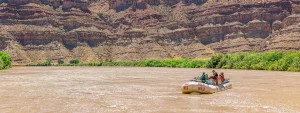 Wide shot of Cataract Canyon with Motor rig boat in middle - Mild to Wild