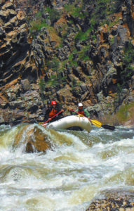 rafting through a rapid in the salt river canyon wilderness