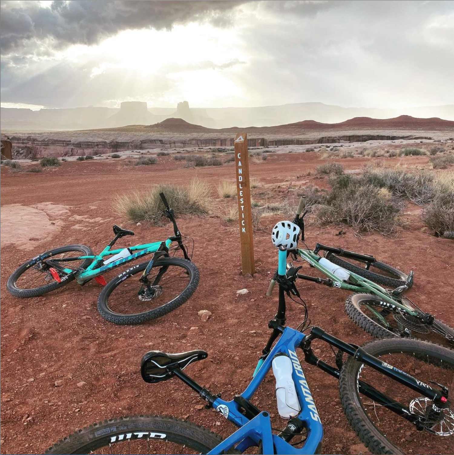 Mountain bikes rain storm moab landscape - Rim Tours Moab - Mild to Wild 