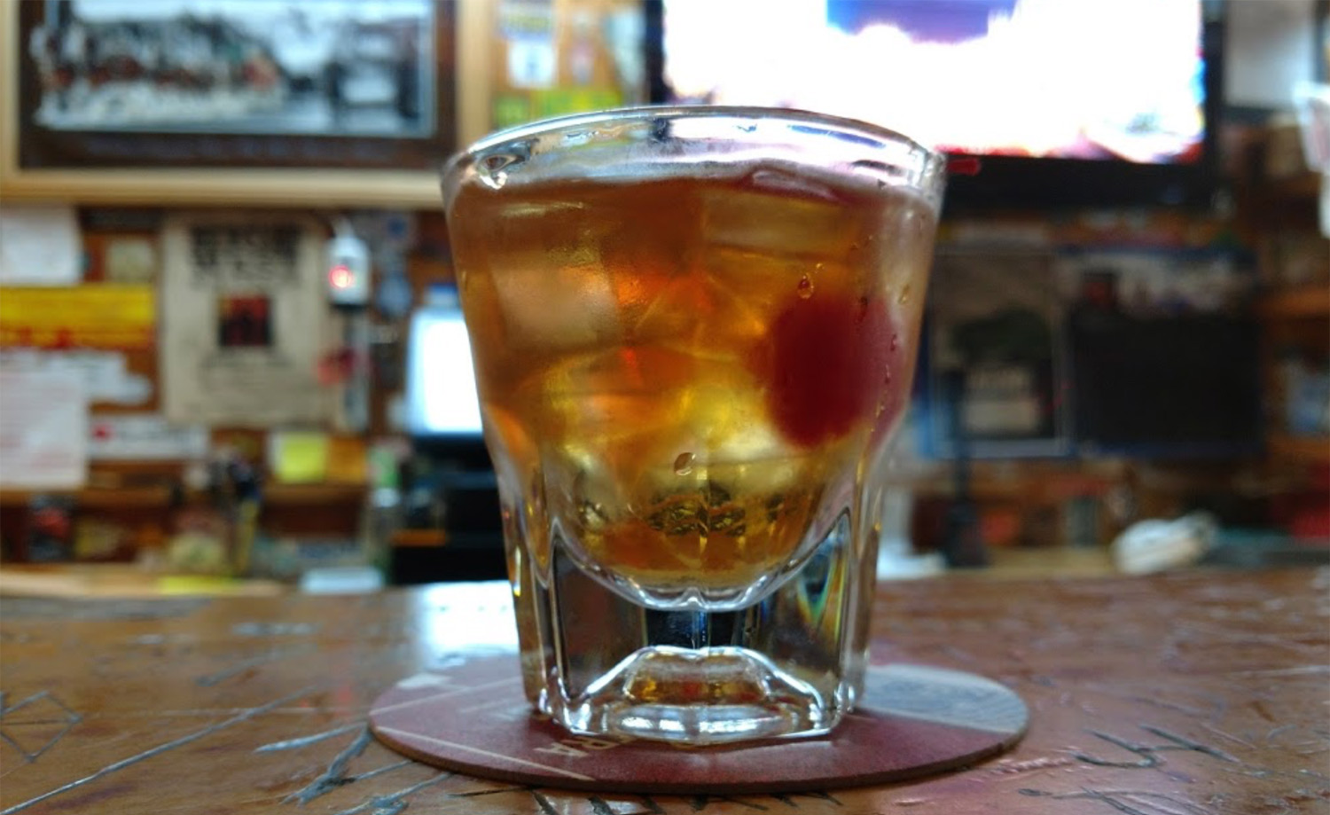 Old fashioned on old bar top - Woody's Tavern - Mild to Wild