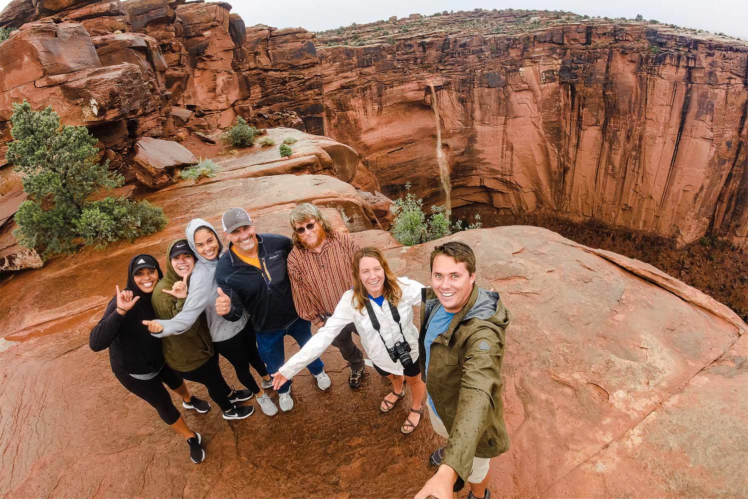 Group Selfie With Waterfall Backdrop - Moab Jeep Tour - Mild to Wild