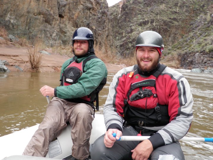 Two Salt River Guides sitting at the back of a raft