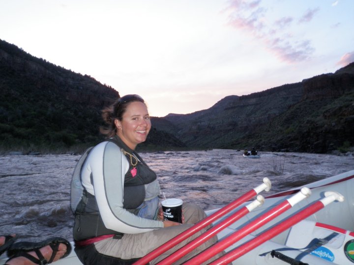 Anna Folks sitting on a raft on the Salt River 