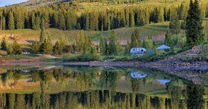 Crystal clear reflection on Molas Lake near Silverton Colorado