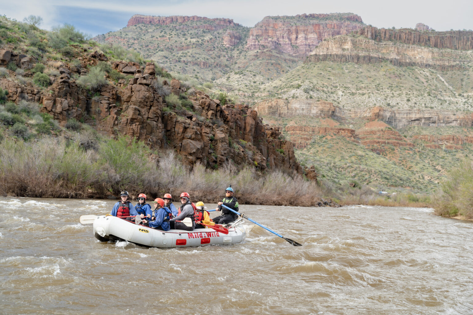a raft floating on the river in the upper salt river canyon