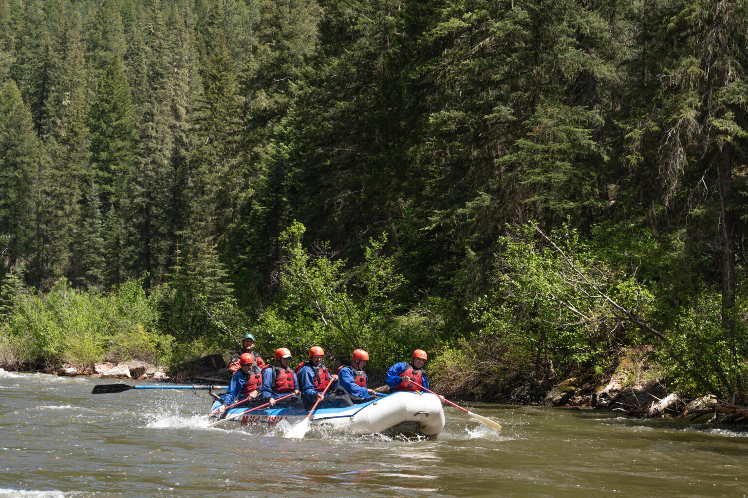 Upper Piedra River - Medium shot of boat with scenic background - Mild to Wild