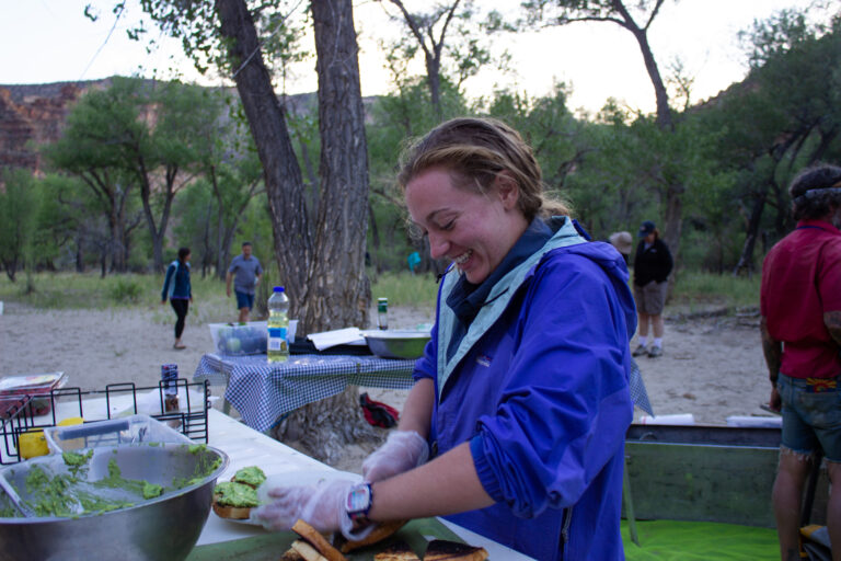 Desolation Canyon river guide preparing avocado toast at camp - Mild to Wild