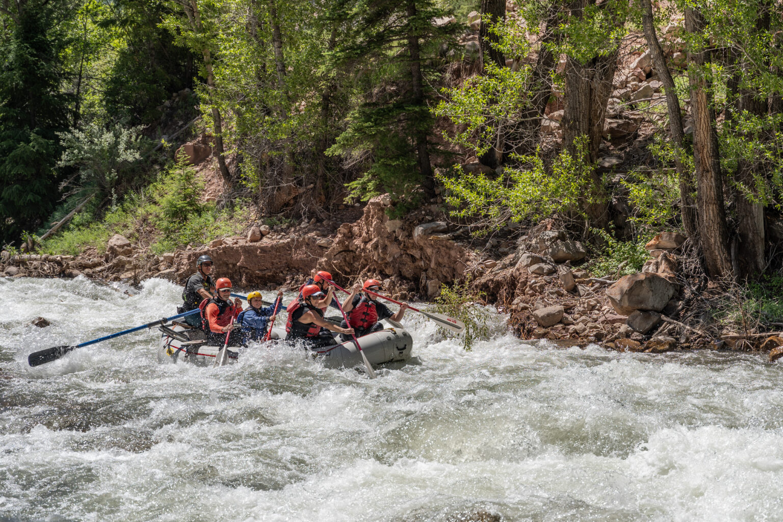 San Miguel River - Raft going through Sawpit rapid