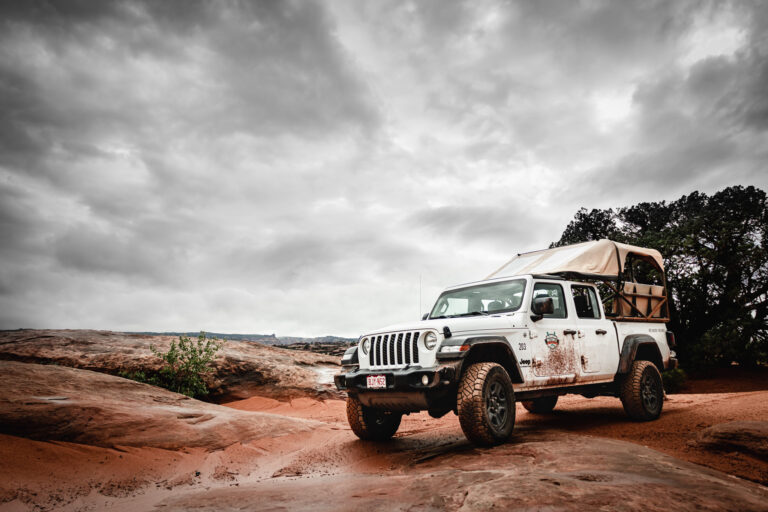 Jeep Gladiator on Desert Terain with gloomy cloudy sky - Mild to Wild