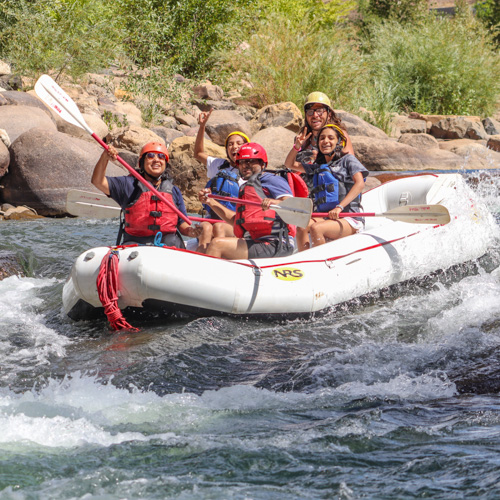 close up of guests on raft going through smelter rapid on the lower animas - mild to wild