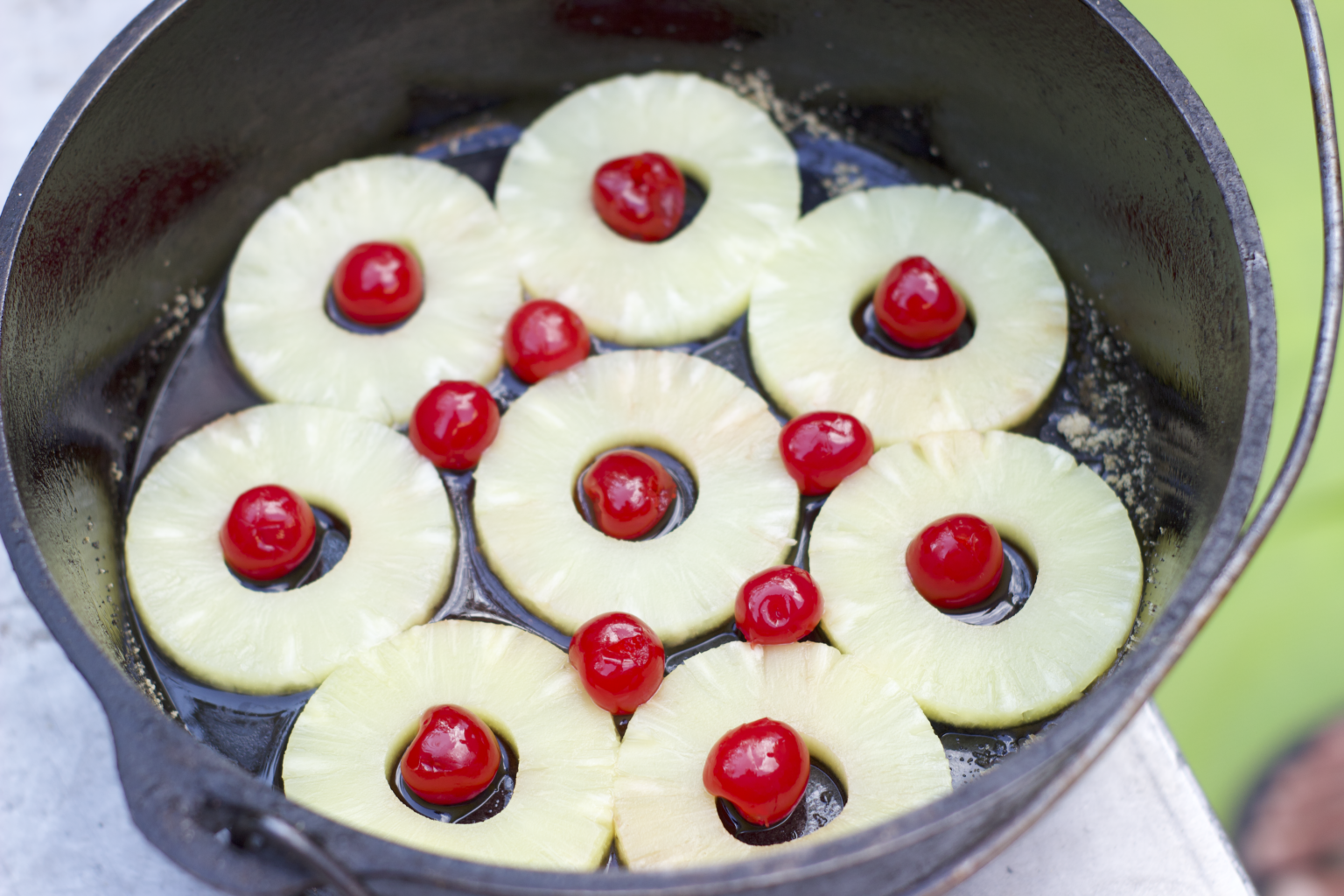 Pineapple upside down cake in dutch oven on a Cataract Canyon rafting trip - Mild to Wild