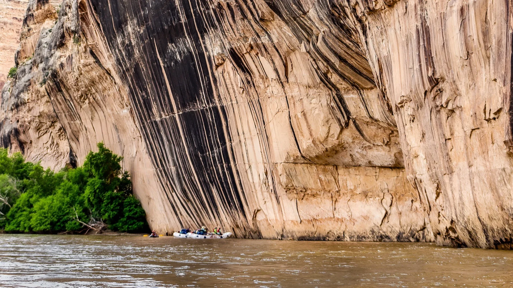 Massive precipice known as Tiger Wall on the Yampa River in Dinosaur National Monument - Mild to Wild