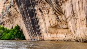 Massive precipice known as Tiger Wall on the Yampa River in Dinosaur National Monument - Mild to Wild