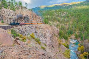 Durango Silverton Train passing above the Animas River in Colorado