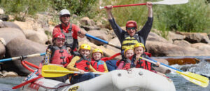 Joyful family rafting on the Lower Animas River - Kids in front - Mild to Wild