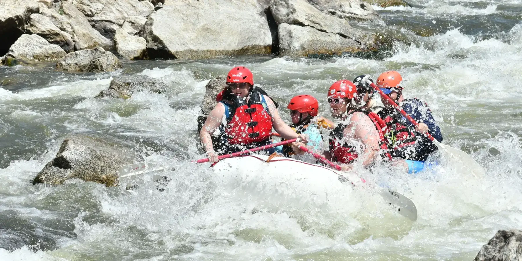 Royal Gorge Whitewater Rafting - Close upof raft with people paddling