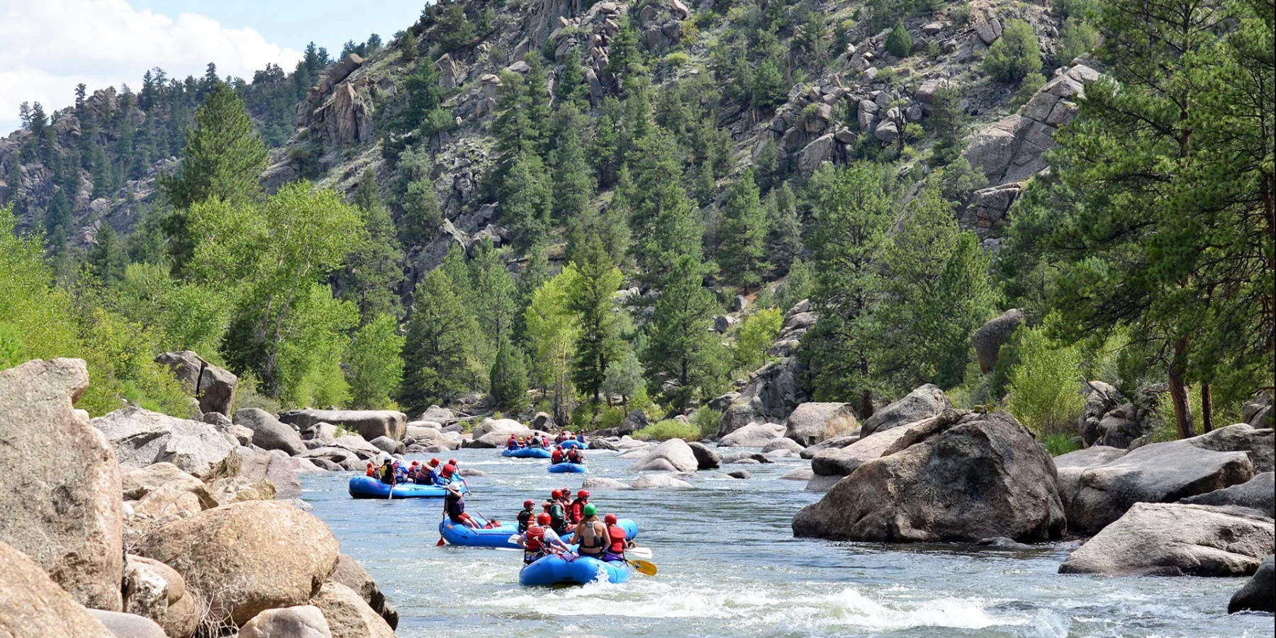 browns canyon -arkansas river rafting - wide shot of rafts and scenery