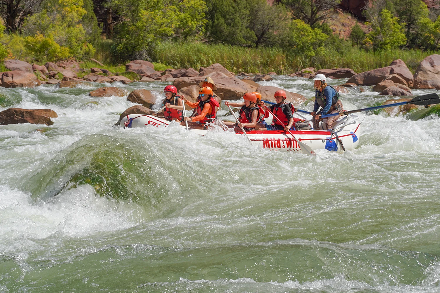 Upper Colorado rapids - rafters paddling through whitewater