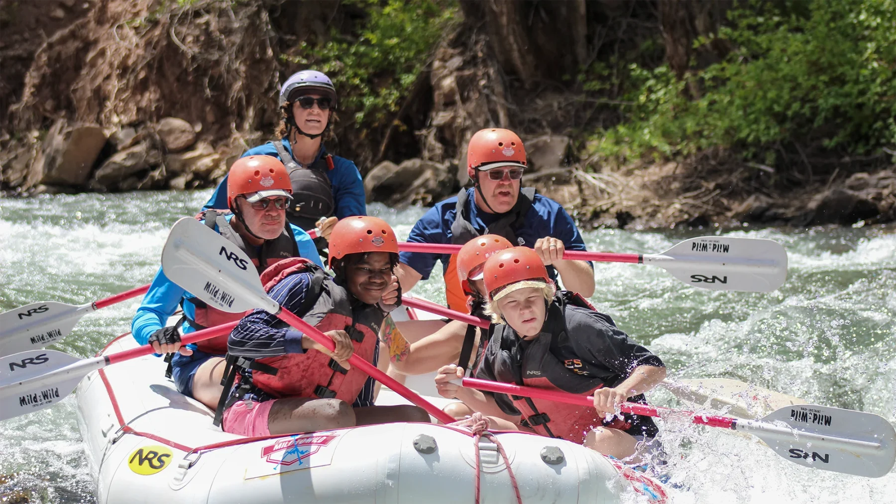 Arkansas River Rafting in Bighorn Sheep Canyon - close up of guests paddling in raft