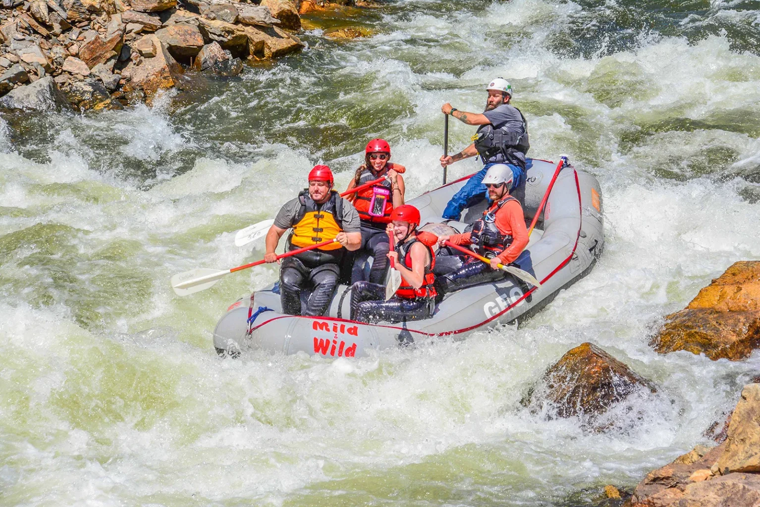 Arkansas River Rafting in the Royal Gorge - medium shot of raft with guests and guide