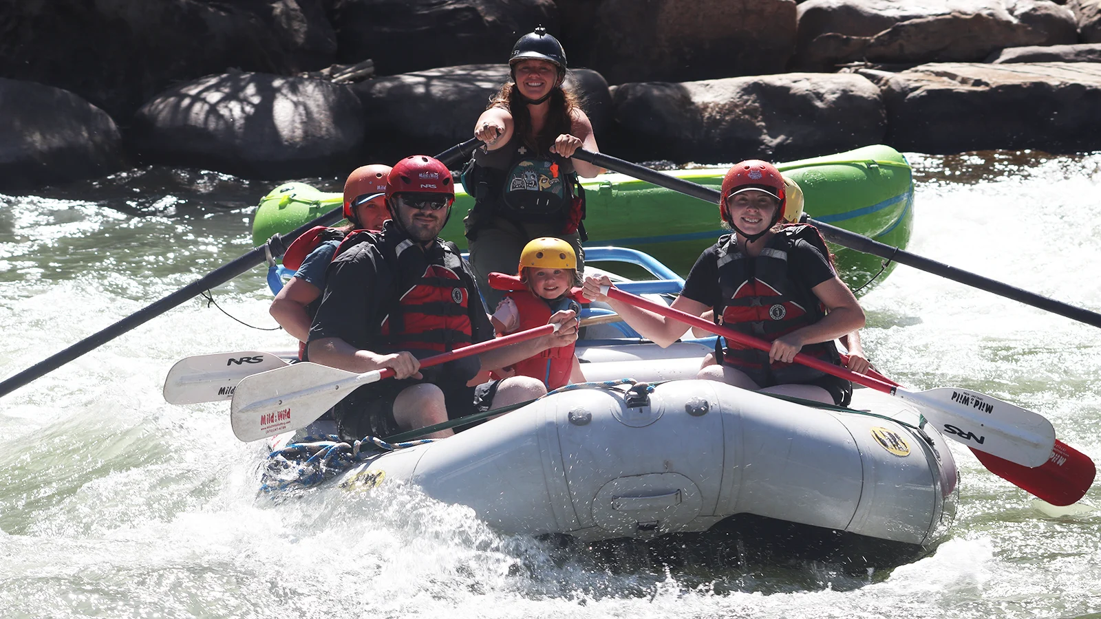 Arkansas-River-rafting-in-Bighorn-Sheep-canyon-smiling guests and guide