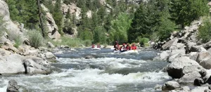 Wide view of Browns Canyon - whitewater rapids and raft paddling through