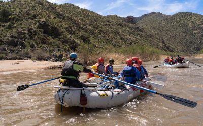 Upper Salt River Canyon - medium shot of boats with beach and desert scenery